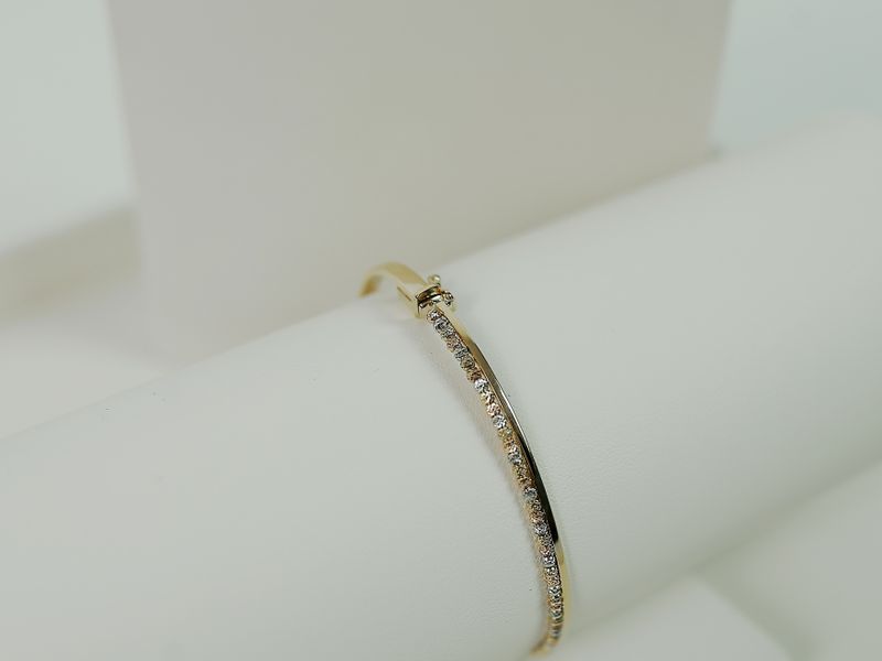 Delicate diamond bracelet on a light surface