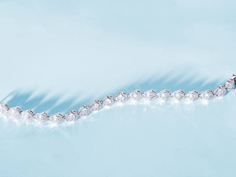 Diamond and pearl strand necklace