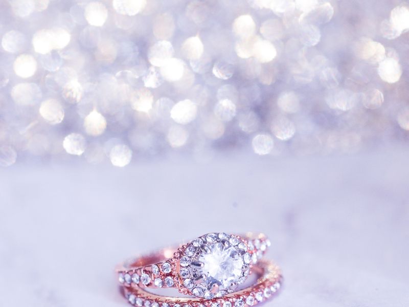 Pink diamond ring sparkling against a soft backdrop